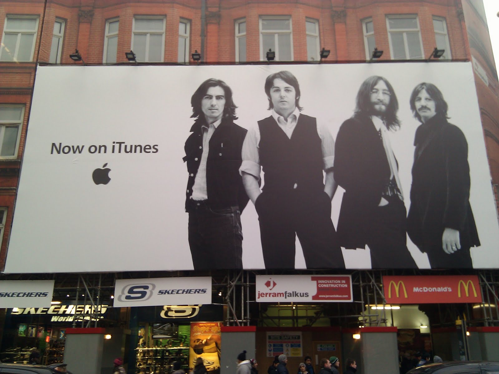 Beatles on itunes Oxford Street poster